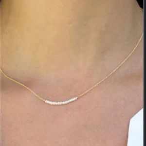 Double layer gold and white pearls necklace